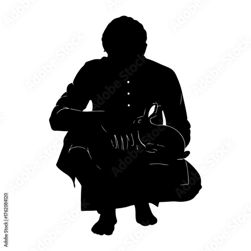Person holding a duck silhouette crouching