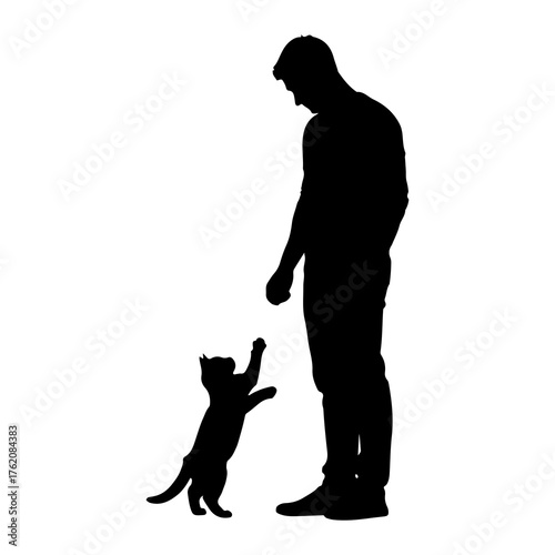 Silhouette man and cat playing interaction