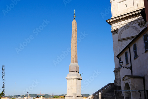 Canvas Print obelisk at Trinità dei Monti in Rome against clear blue sky