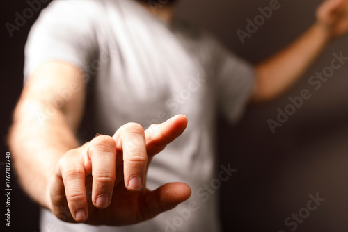 Close-up of a human hand po...