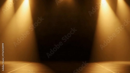 Stage spotlight lighting an empty wood floor in a dark room