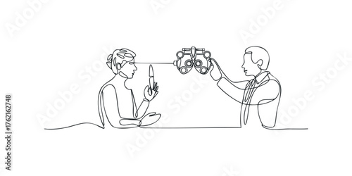 Optometrist examining patient with phoropter