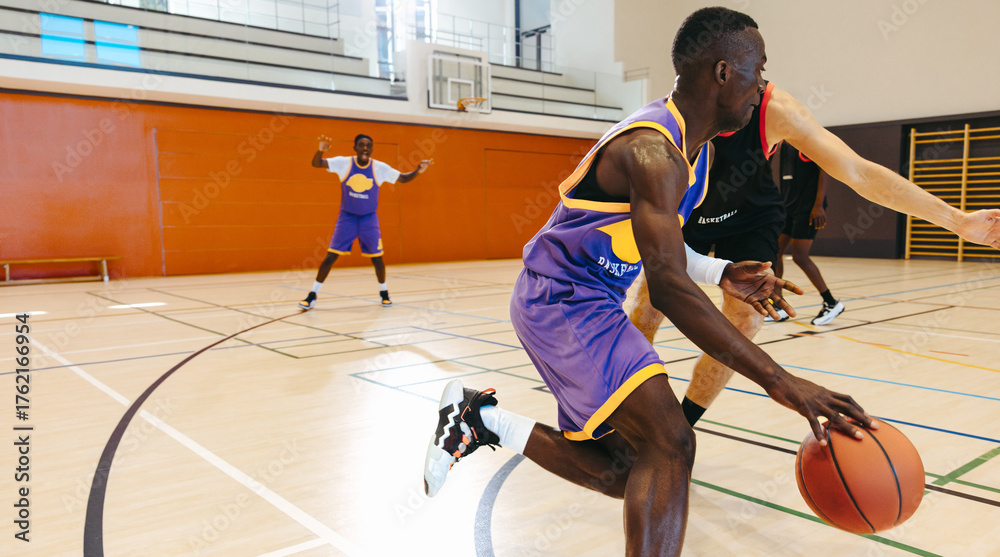 Naklejka premium Basketball players competing in a game