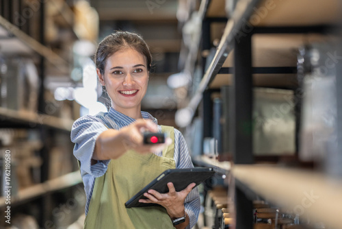A Female Entrepreneur in a Family Run Ceramic Business Checking Stock
