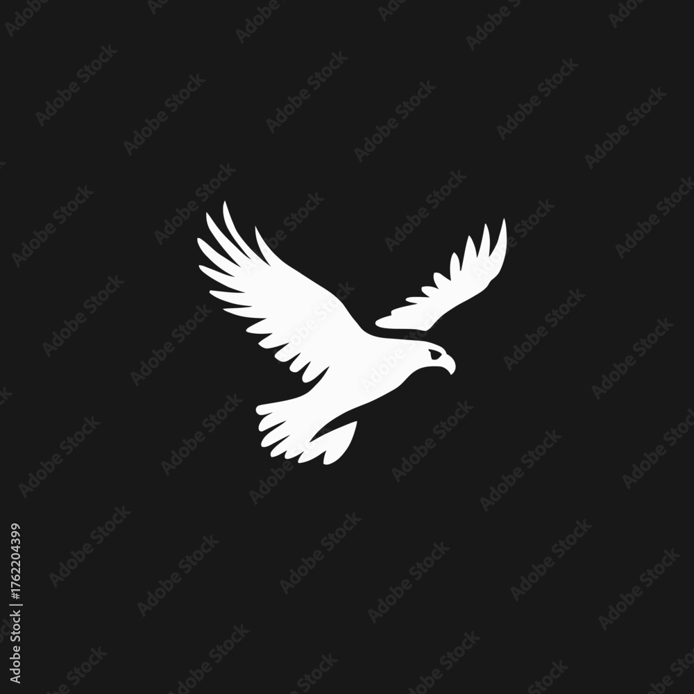 Fototapeta premium Majestic white eagle or hawk silhouette in graceful flight against a dark background. Powerful and minimalist vector graphic design symbol.