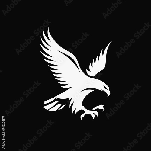 Dynamic white flying eagle silhouette on a stark black background, symbolizing power, freedom, vision, and strength. Majestic bird of prey design.