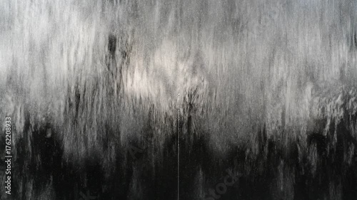 Black water wall, dark water feature, black fountain wall.