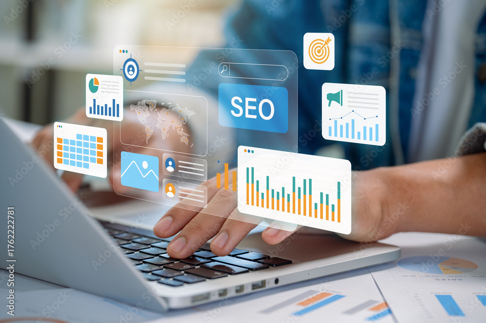 Fototapeta premium Digital marketing analysis working on SEO strategy using data visualization and performance dashboards on laptop in office showing graphs, charts and growth tracking for online visibility optimization