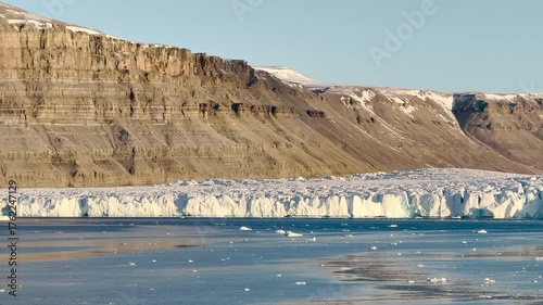 Observe the breathtaking melting ice formations in Greenland as climate change reshapes the landscape. This striking transformation highlights the urgent need for action in our world.