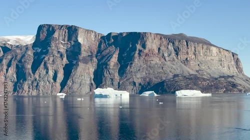 Observe the breathtaking melting ice formations in Greenland as climate change reshapes the landscape. This striking transformation highlights the urgent need for action in our world.