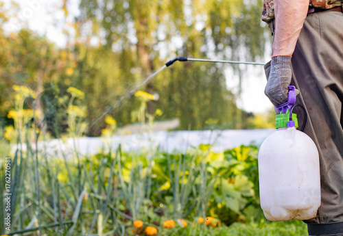 Water the garden. Spray the plants against pests. Spray fertilizers.