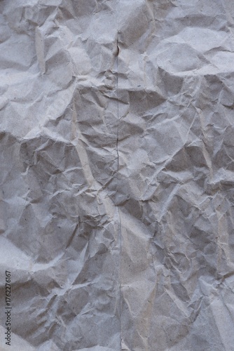 Brown crumpled recycled paper texture background. Kraft Paper