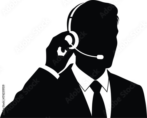 Silhouette of man wearing headset and suit on white background Keywords: silhouette, man, center, silhouette, background, information, representative, isolated, office, earphone, consultant, connectio