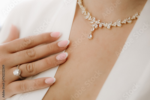 Photos Woman putting on luxury jewelry, elegant accessories and fashion concept, stylis