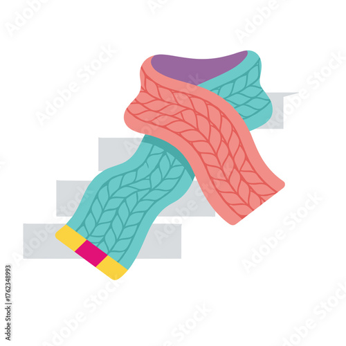 Colorful knitted scarf draped over steps in winter concept  