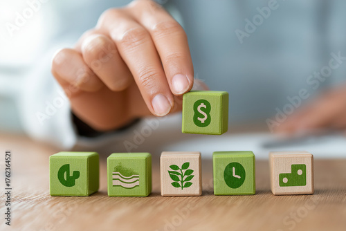 Employee perks visual with hand arranging green blocks for insurance, pension, paid time off, and financial support in casual work environment 