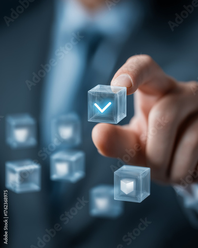 Manager’s hand placing cube with compliance icon for integrity, performance, and regulatory excellence in professional business setting
