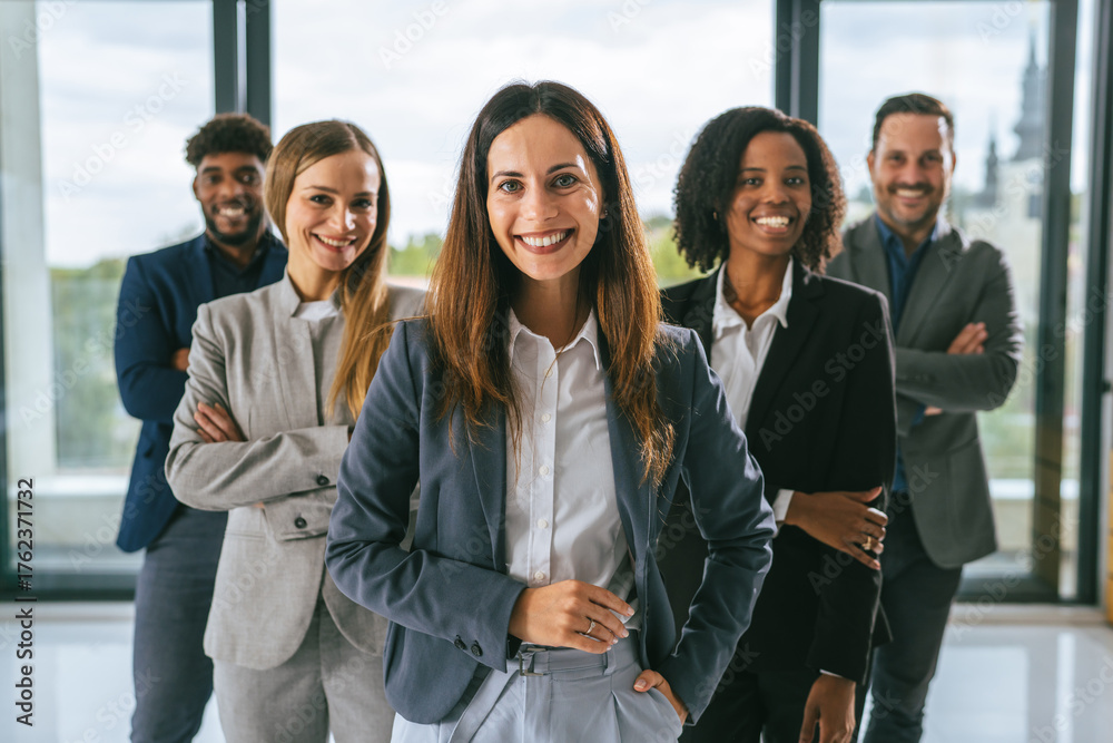 Obraz premium Diverse business team smiling standing in office