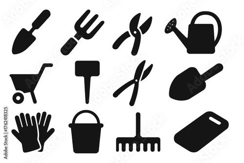 Garden Tools Icons. Solid style icons of Garden Tools: metal trowel, hand fork, pruning shears, watering can, seed spreader, plant