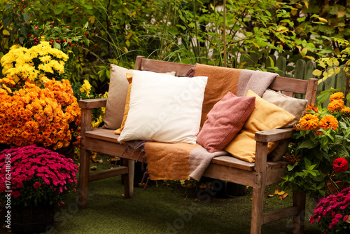 Colorful garden seating with vibrant flowers and soft cushions in a cozy outdoor setting
