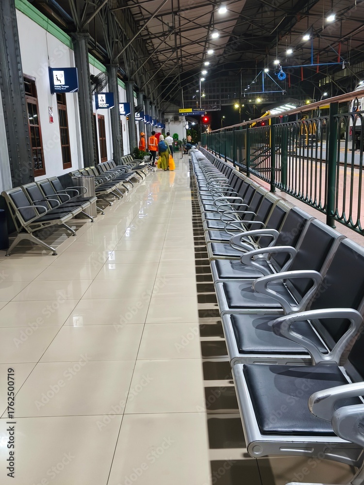 Fototapeta premium Empty Waiting Seats and Station Hall Interior