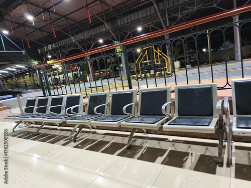 Empty Waiting Seats and Station Hall Interior