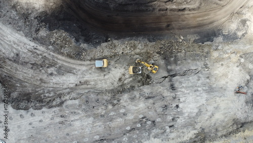 Принти на полотні The process of an excavator loading coal onto a truck to be taken to the product