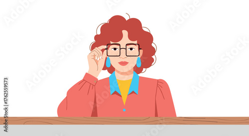 Woman with glasses looking forward.