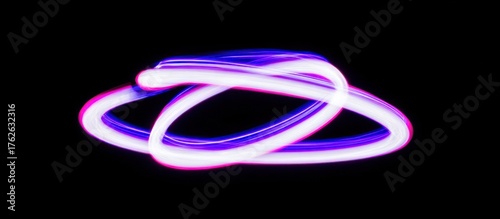 Abstract Light Trails on Black Background.