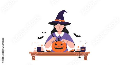 Young woman in witch costume carving a Halloween pumpkin.