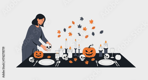 Woman setting Halloween table with pumpkins and skulls for festive dinner.