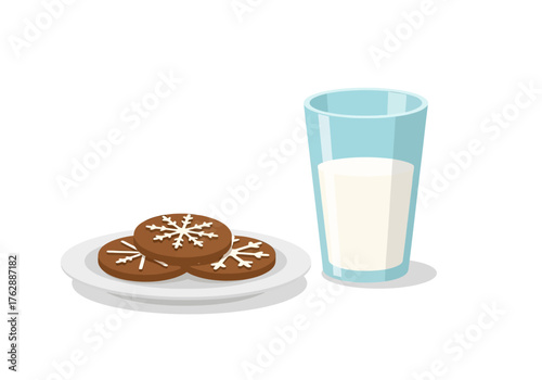 A glass of milk stands beside a plate of decorated gingerbread cookies