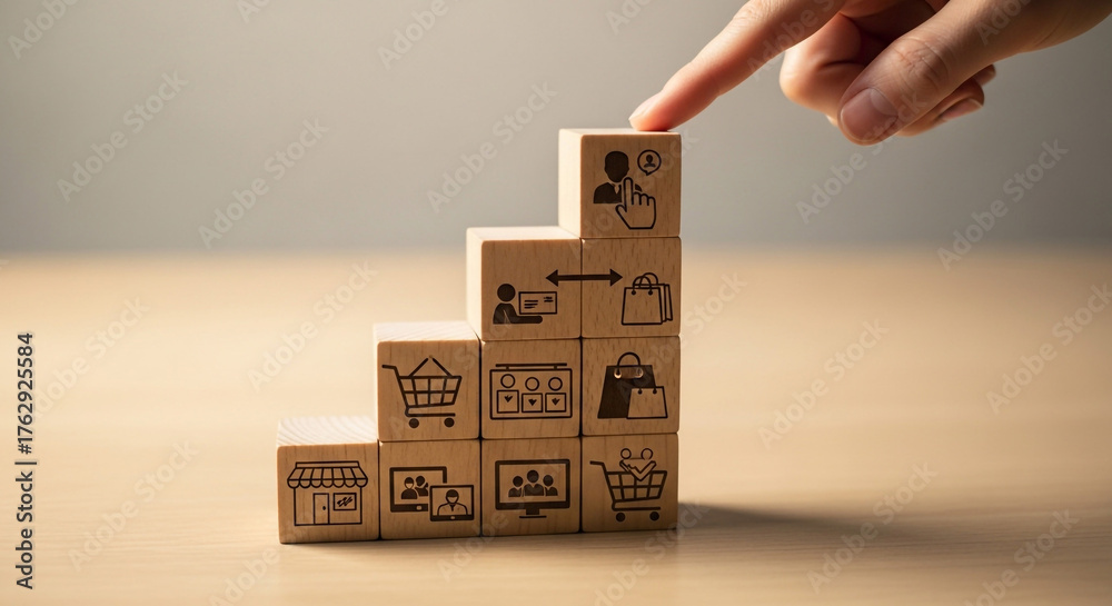 Fototapeta premium E commerce growth strategy online shopping business success plan wooden blocks finger pointing concept