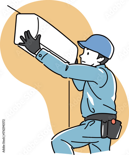 エアコンを設置又は取り外しをする男性作業員