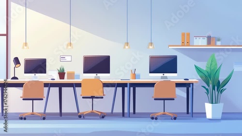 Modern coworking space with computer workstations and natural light ambiance ideal for office