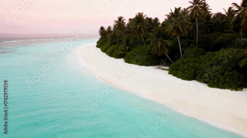 Aerial Drone View Of Tropical Island Paradise With White Sand Beach Lush Green Palm Trees And Turquoise Ocean Water During Sunset Golden