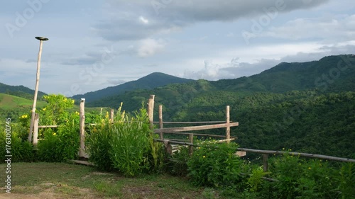 A wooden balcony at a view point with mountain views
