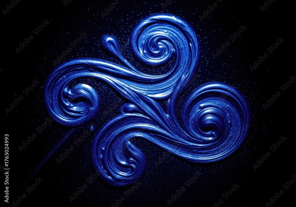 Obraz premium Intricate swirling pattern of deep sapphire blue shimmer liquid on a dark background