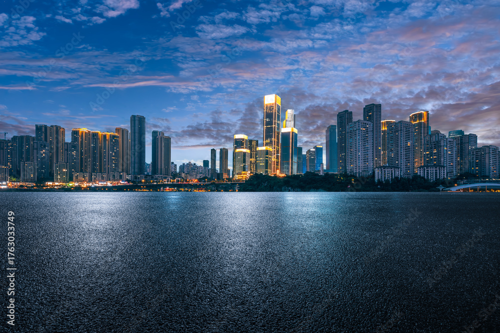 Fototapeta premium Empty asphalt ground with city skyline and financial district in Chongqing.