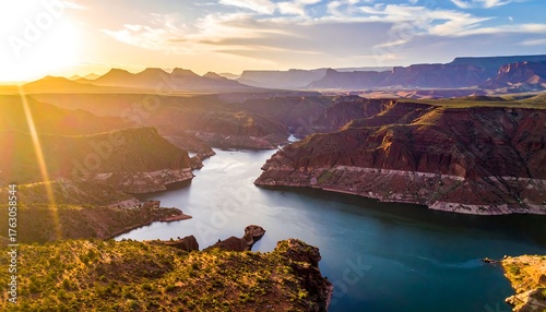 Konstfotografi Aerial vista captures a winding canyon and river at sunset