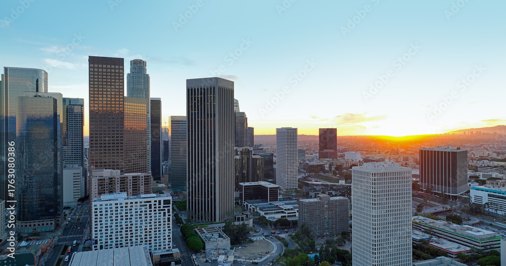 Fototapeta premium Aerial drone view of downtown Los Angeles with skyscrapers. Los Angeles skyline panorama. Aerial shot of LA city center.