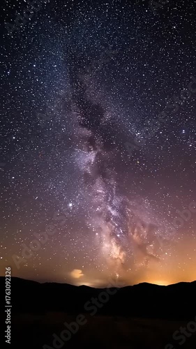 Stunning view of the Milky Way galaxy over a serene landscape at night with twinkling stars