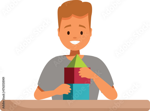 Smiling preschooler building a tower with colorful blocks, developing fine motor skills and creativity