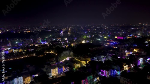 Wallpaper Mural Aerial drone shot of city in diwali with lights on houses  Torontodigital.ca