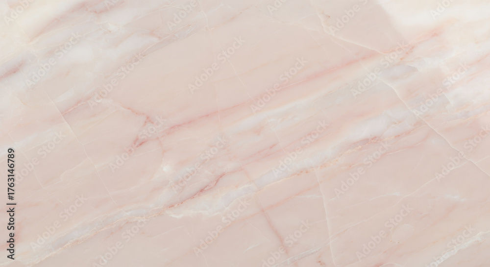 Fototapeta premium Soft pink marble surface with delicate veining and smooth polished texture for elegant interior design
