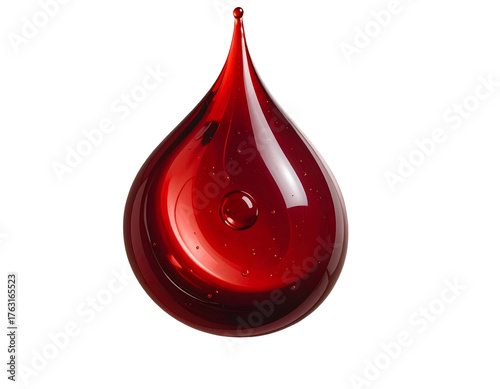 A single, glossy, crimson teardrop-shaped object against a black background