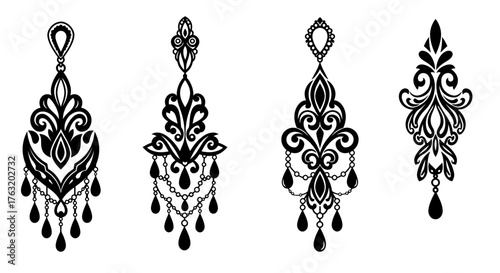 Elegant black ornate dangle earrings collection decorative jewelry accessories detailed design elements formal wear isolated on white background