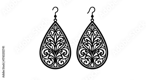 Elegant teardrop filigree earrings intricate floral pattern detailed metal jewelry accessories bohemian style design isolated on white background