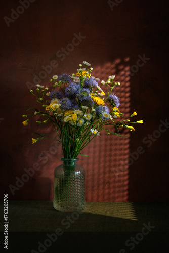 Still life with a magnificent bouquet of meadow flowers.
