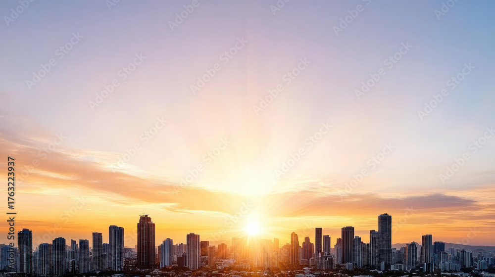 Fototapeta premium Sunrise over city skyline with tall buildings and vibrant colors sky, creating peaceful